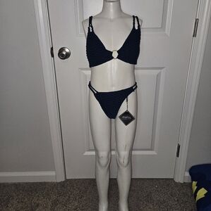 Navy Blue Bikini top .  Top small . Bottoms are medium.